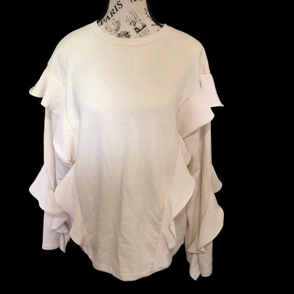A new day Cream Terry Pullover with frill detail.